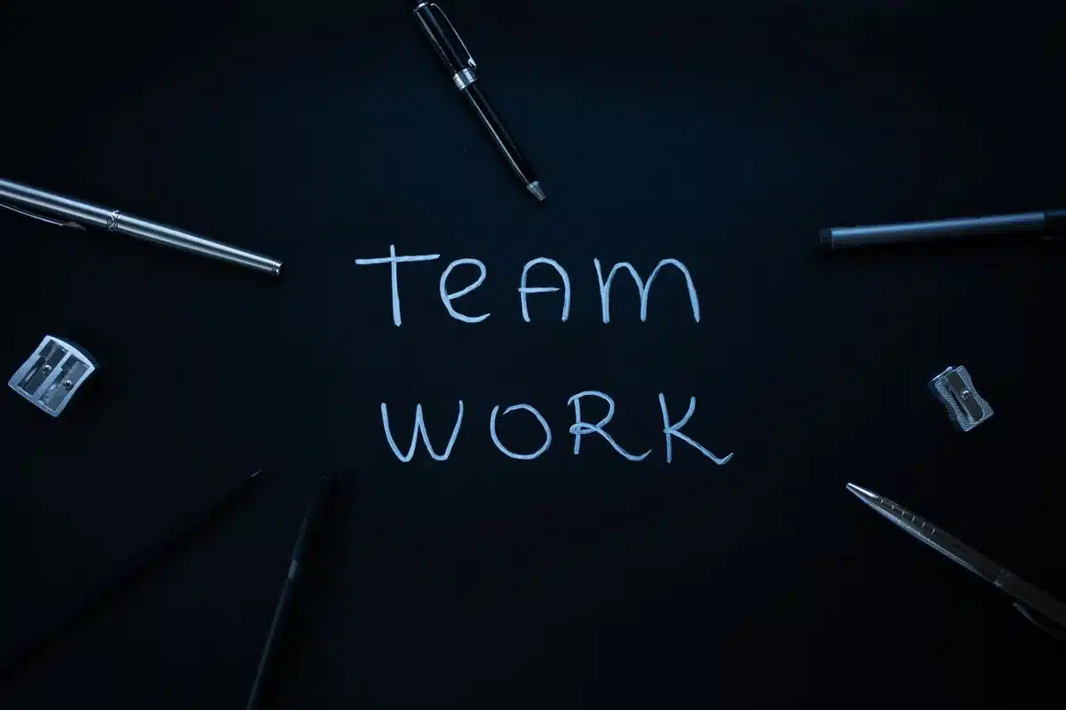Team members having conversation in modern office environment