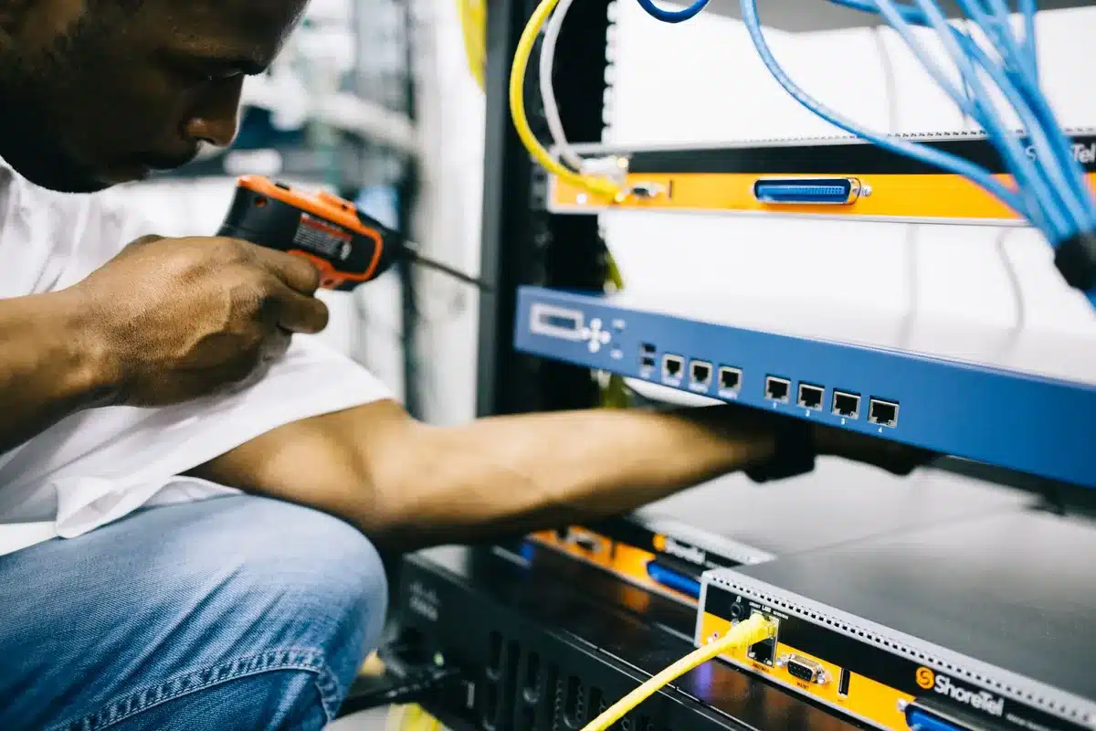 Construction workers building infrastructure for data centers and technology systems