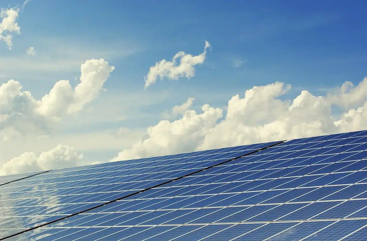Manufacturing facilities producing solar panels, wind turbine components, and battery systems for clean energy