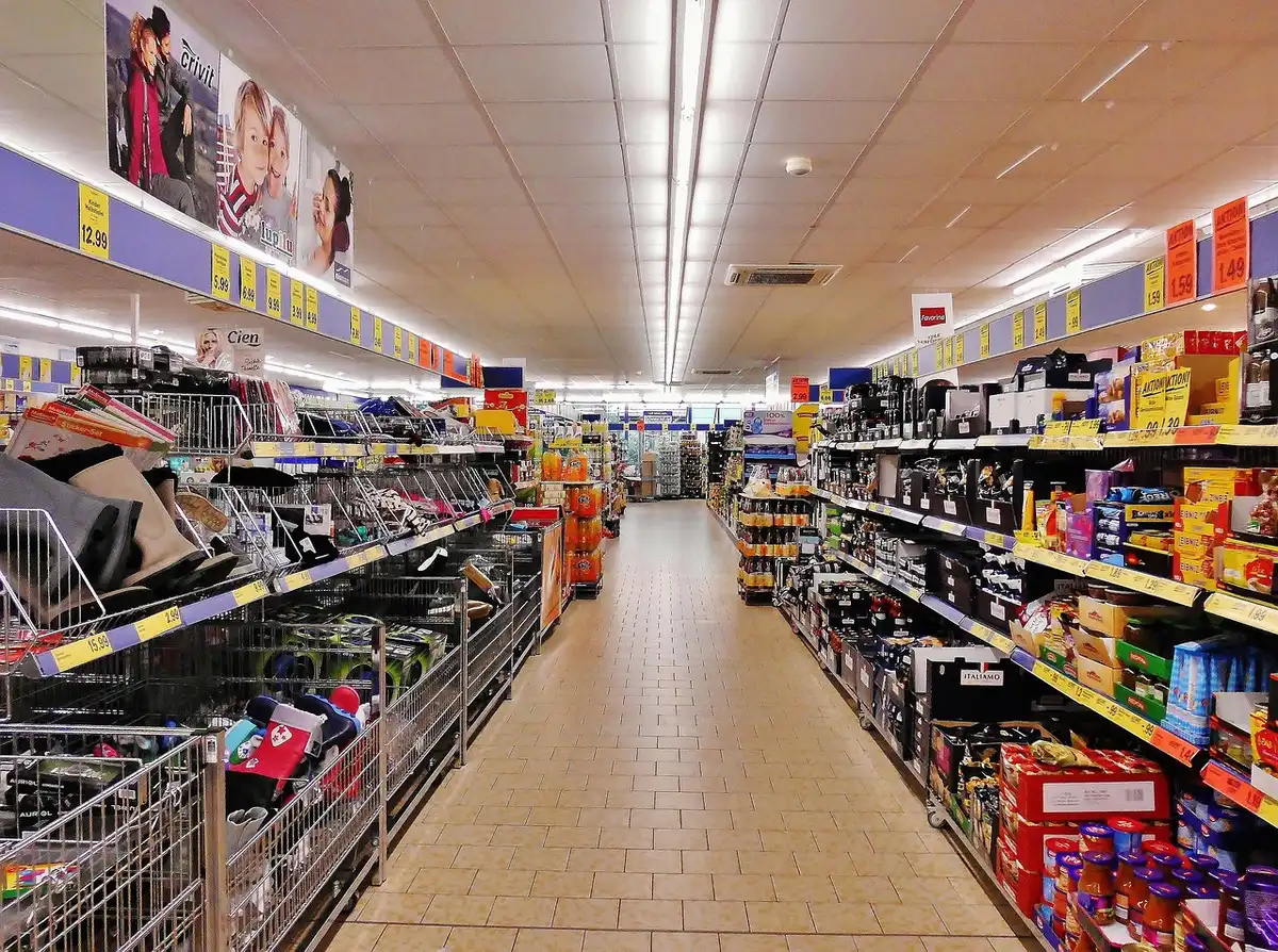 Abundant frozen whitefish products stocked on supermarket shelves, ready for purchase