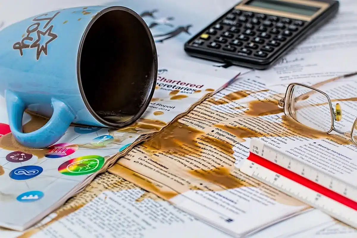 Family reviewing college costs with calculator and papers
