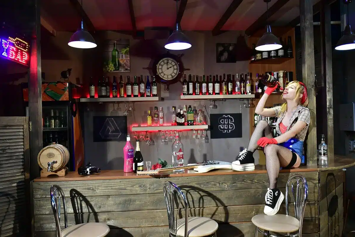 Young adults socializing at a bar illustrating survey results about meeting in real life
