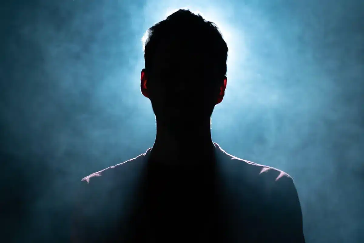 Anonymous lawmakers' silhouettes in a Capitol corridor